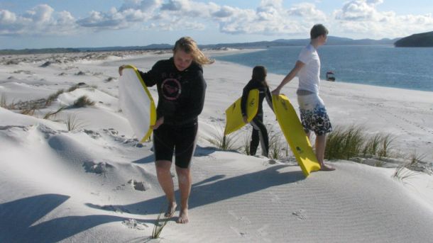 Sand dune surfing